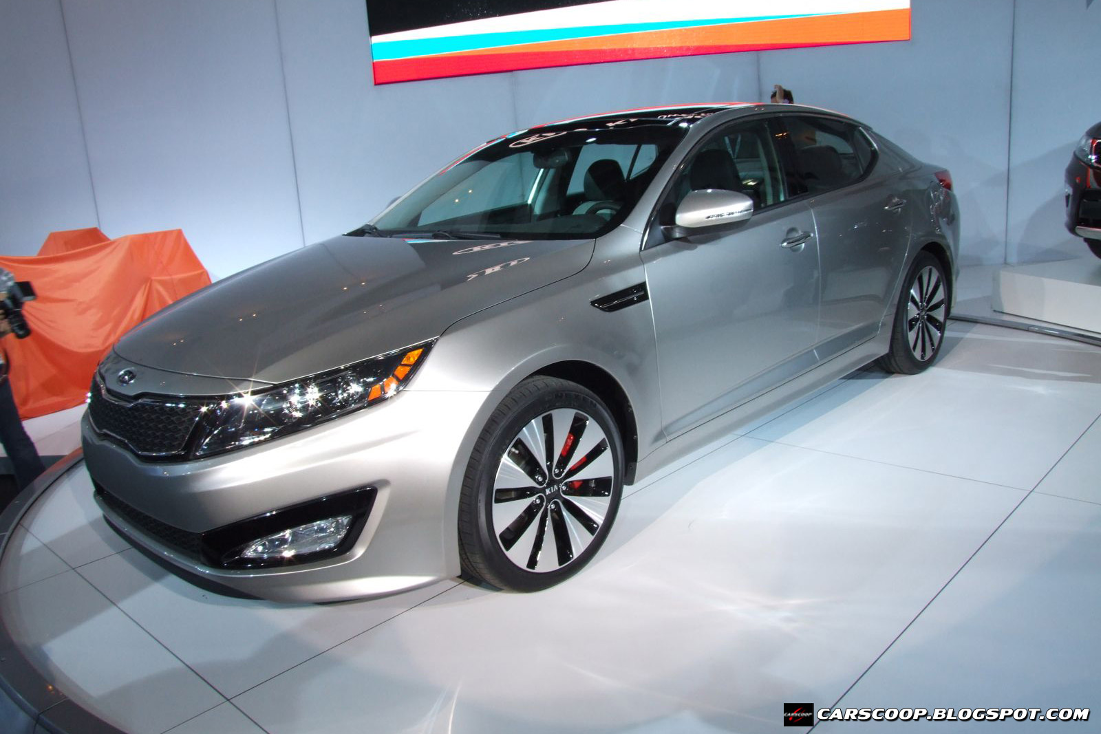 Kia Optima II: 10 фото